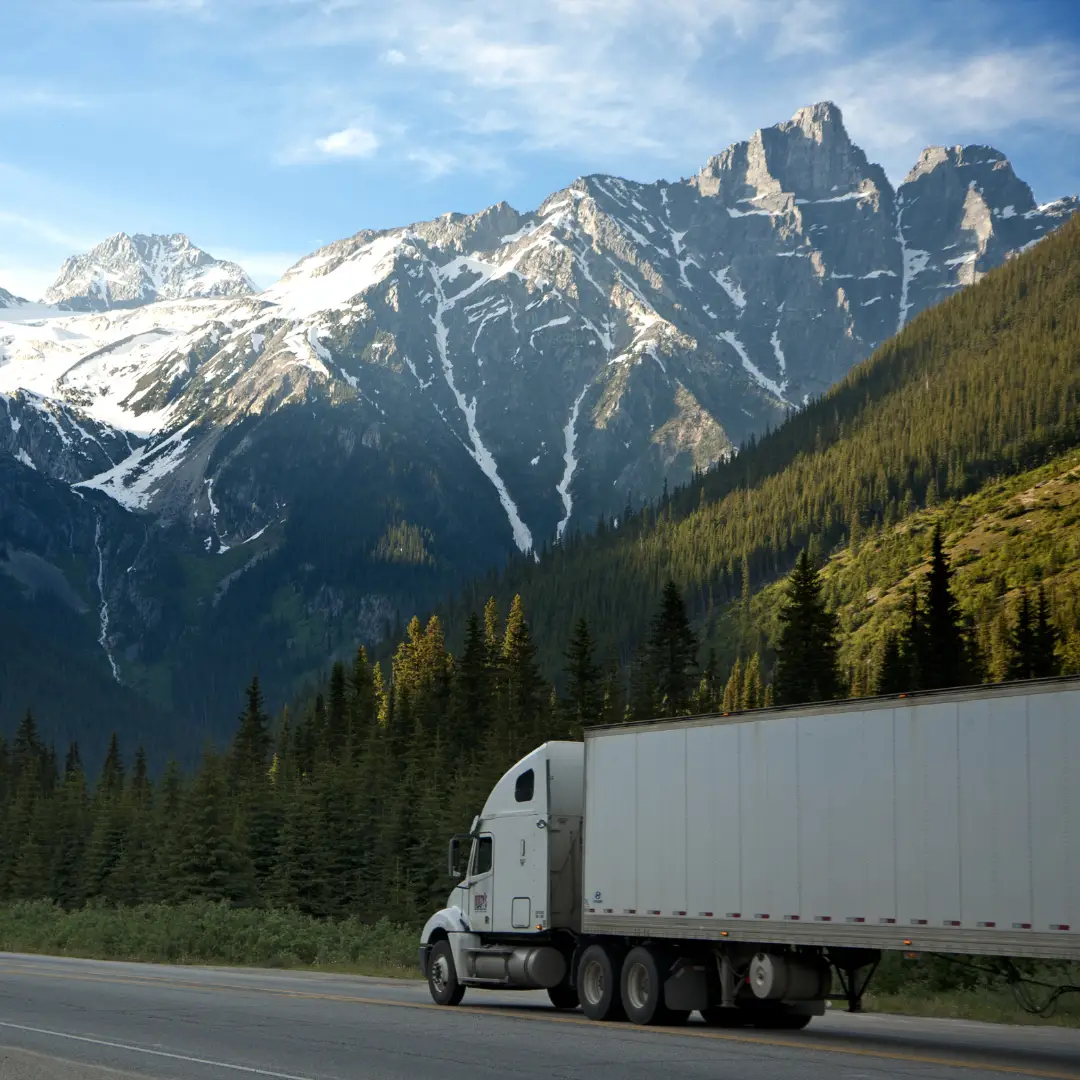eAPUs: How to get the most out of them. Truck driving on road featured image.
