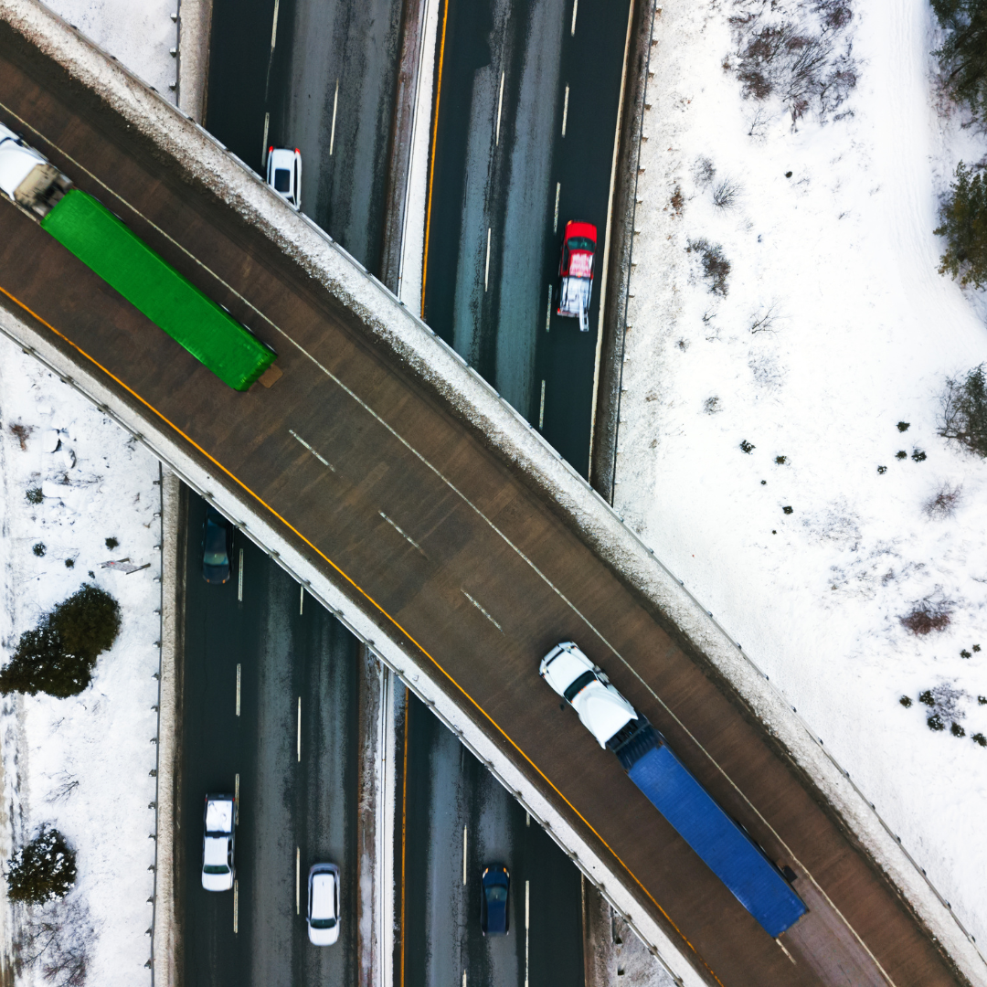 NOX Limits Image showing trucks on highway creating emissions