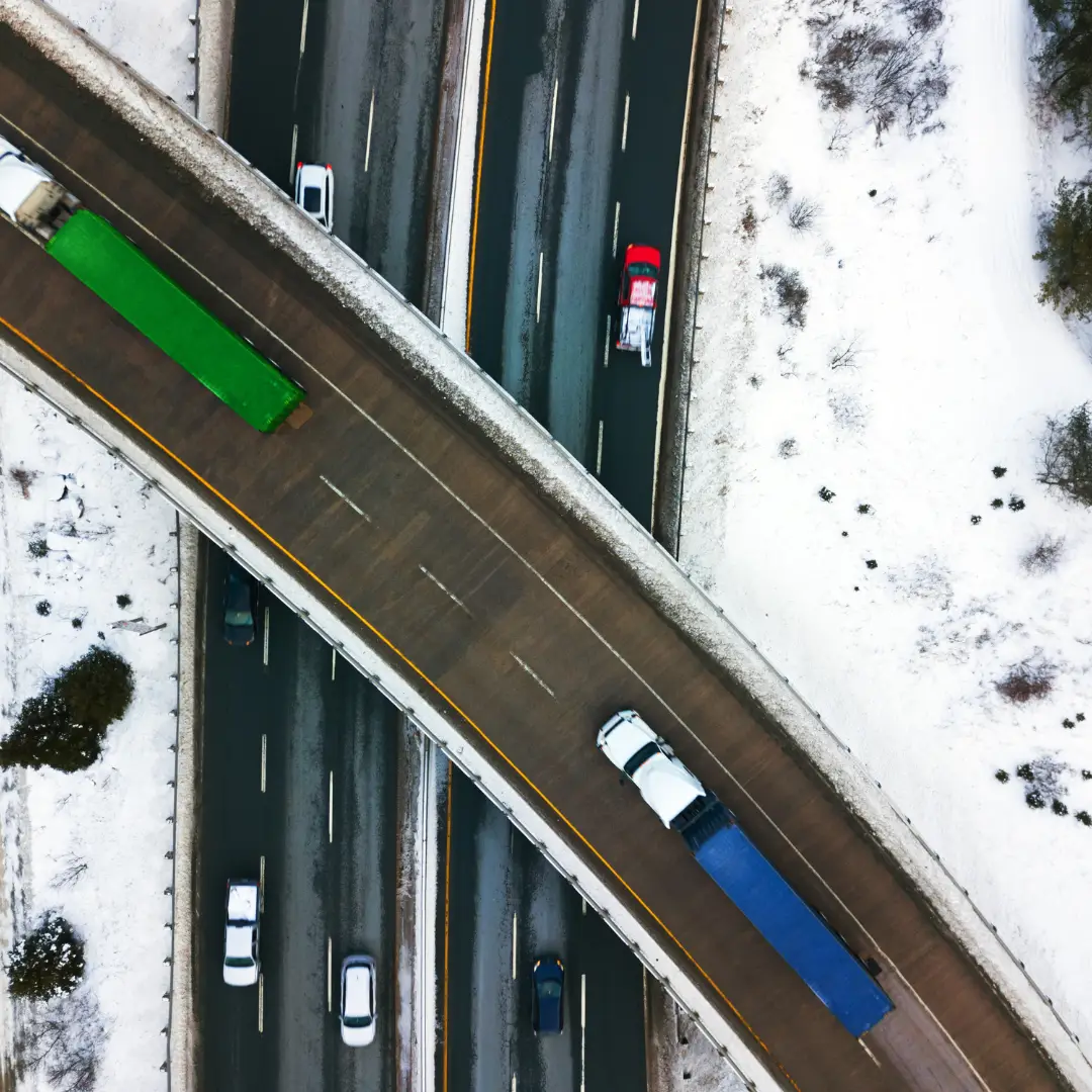 NOX Limits Image showing trucks on highway creating emissions