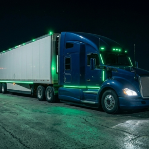 Blue Semi truck at truck stop; Diesel prices over $5/gallon blog image header